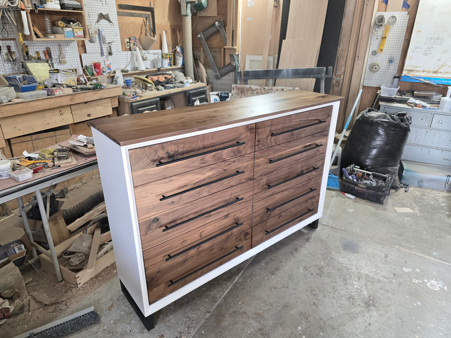 Handcrafted modern 8 drawer dresser in white with real walnut on 5" steel legs