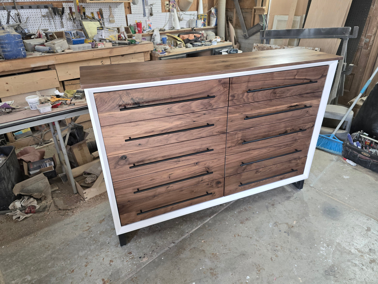 Handcrafted modern 8 drawer dresser in white with real walnut on 5" steel legs