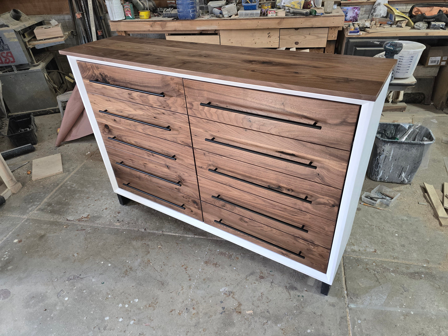 Handcrafted modern 8 drawer dresser in white with real walnut on 5" steel legs