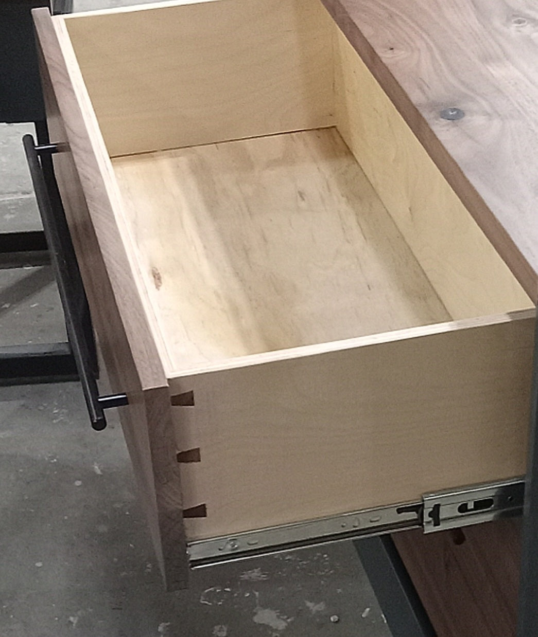 60" Modern 6 drawer dresser in iron finish with walnut fronts and top.