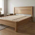 Angled view of white oak platform bed frame with slats exposed in a bedroom scene