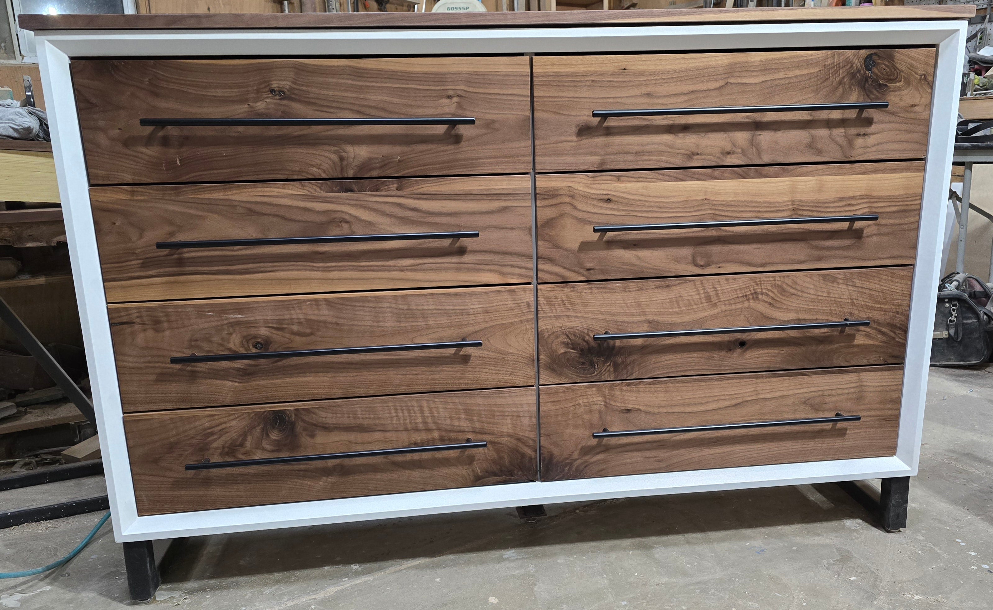 Handcrafted modern 8 drawer dresser in white with real walnut on 5" steel legs