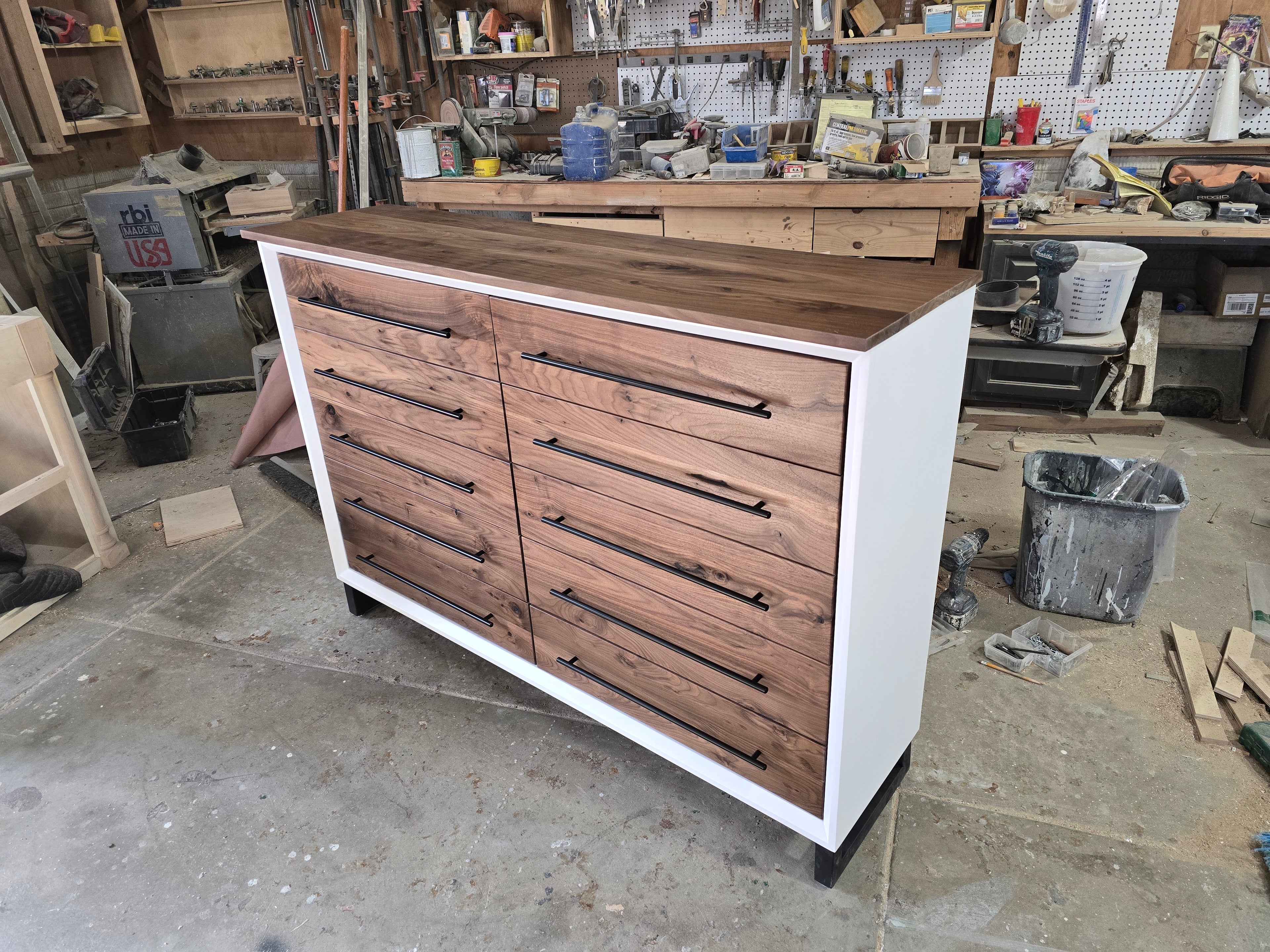 Handcrafted modern 8 drawer dresser in white with real walnut on 5" steel legs