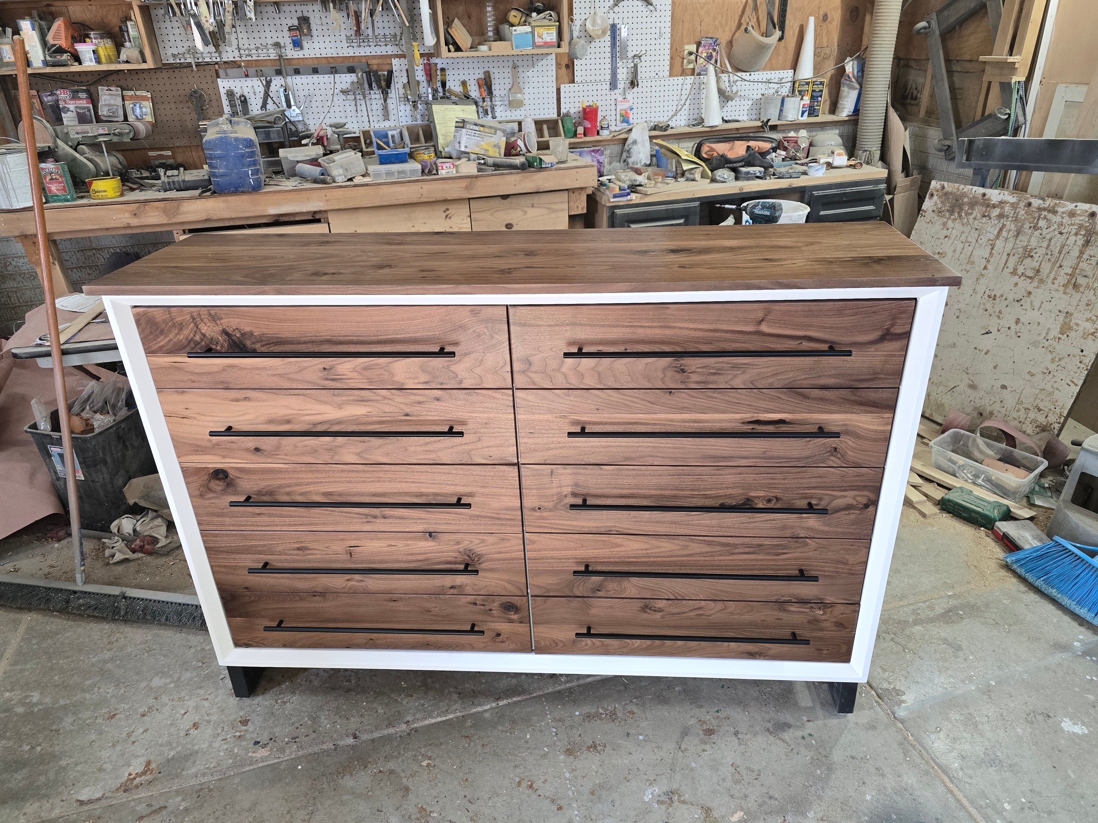 Handcrafted modern 8 drawer dresser in white with real walnut on 5" steel legs