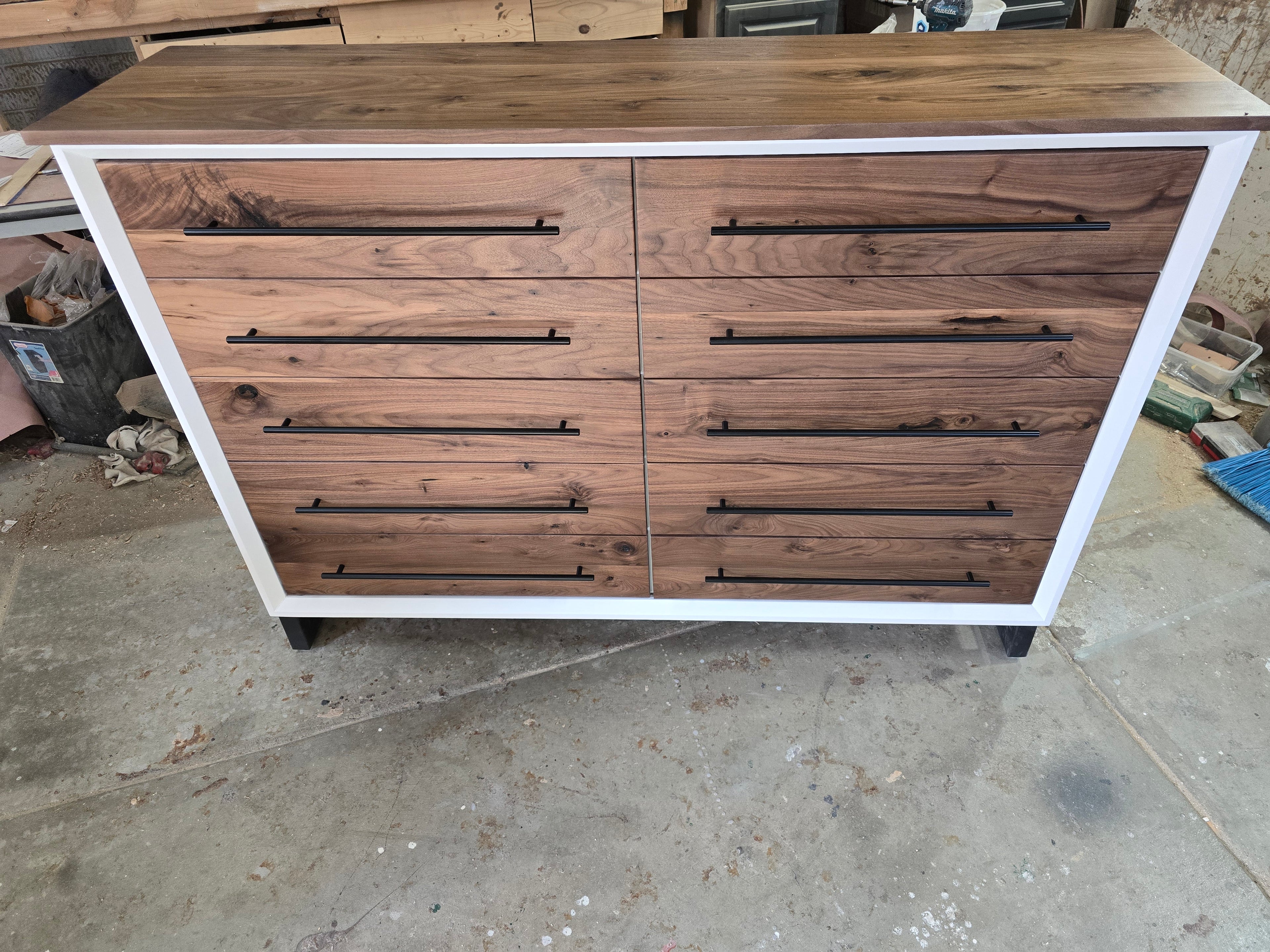 Handcrafted modern 8 drawer dresser in white with real walnut on 5" steel legs