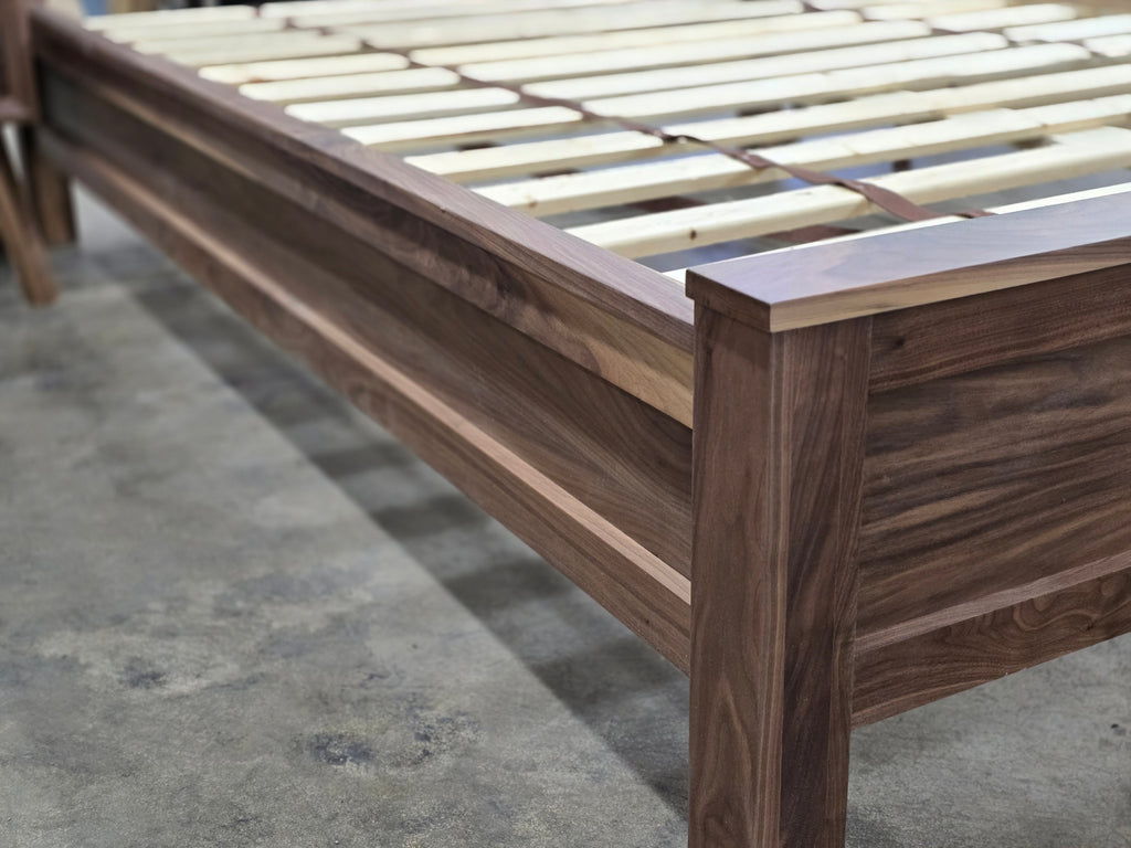 Walnut bed side rail, corner post and slat supports viewed from above