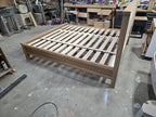 Overhead workshop view of white oak bed slats and center supports