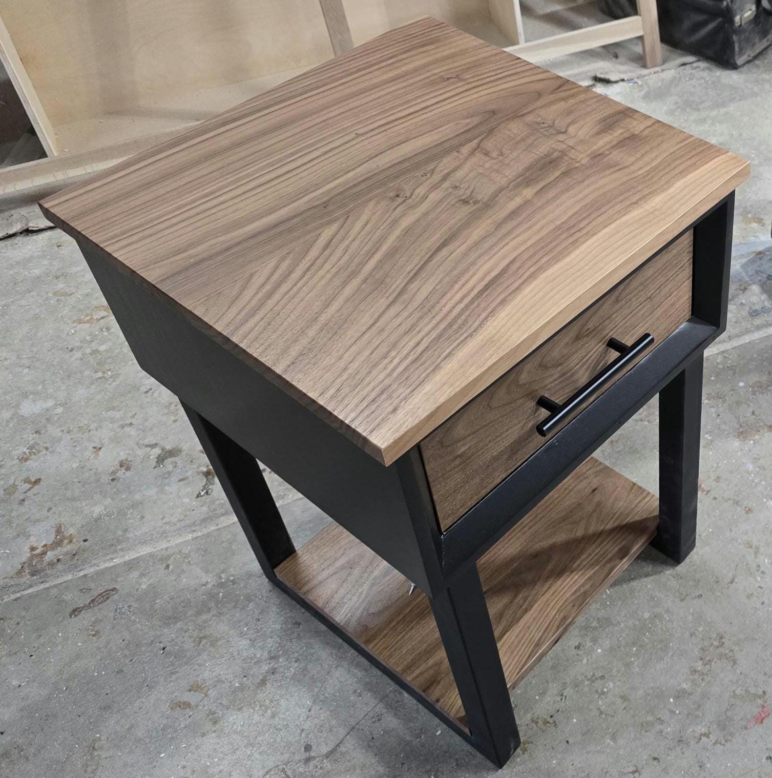 Handcrafted single drawer modern nightstands in black with real walnut and bottom shelf on steel legs