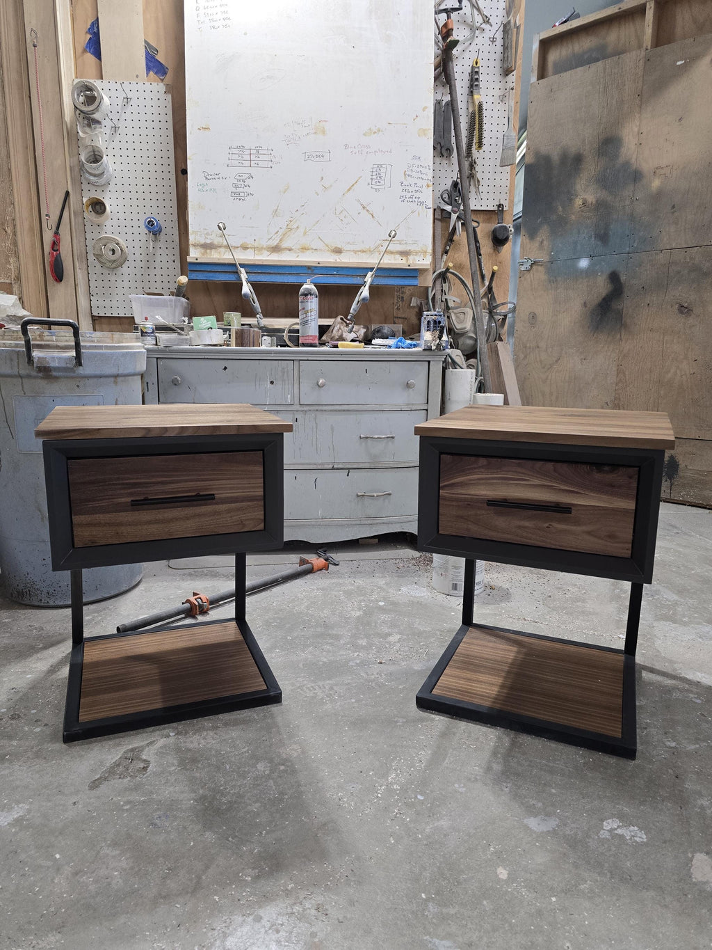 Handcrafted single drawer modern nightstands in black with real walnut and bottom shelf on steel legs
