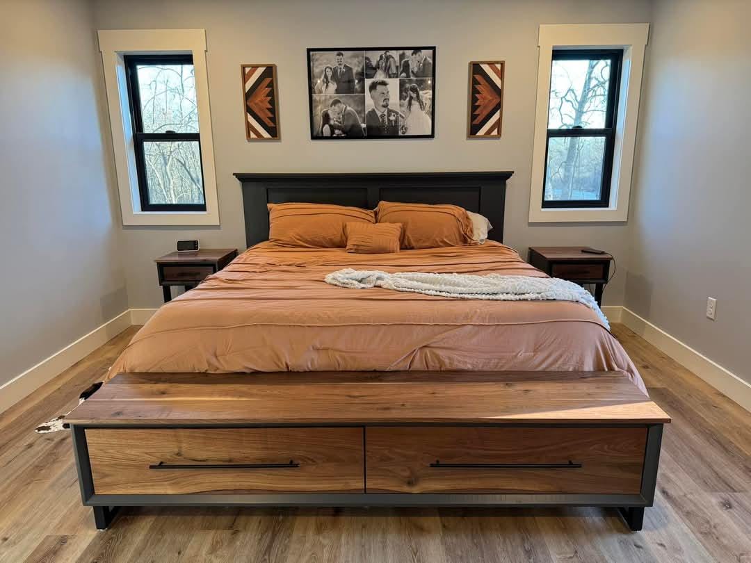 Front view of platform bed and two-drawer footboard bench with brown bedding