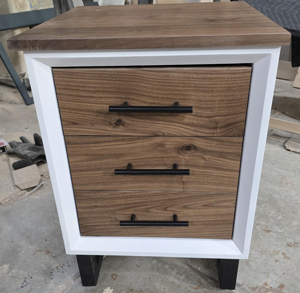 Handcrafted to order. 3 drawer nightstand in a white finish with real walnut fronts and top.
