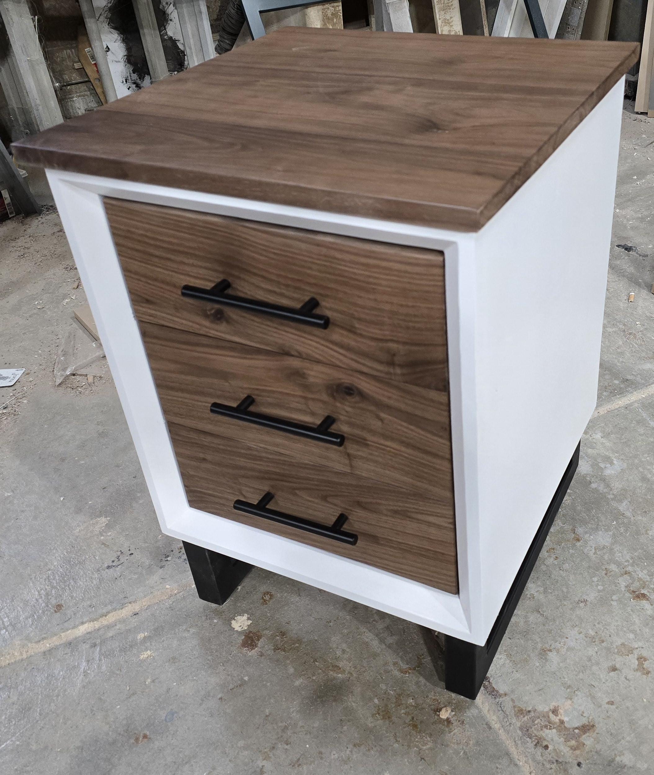 Handcrafted to order. 3 drawer nightstand in a white finish with real walnut fronts and top.