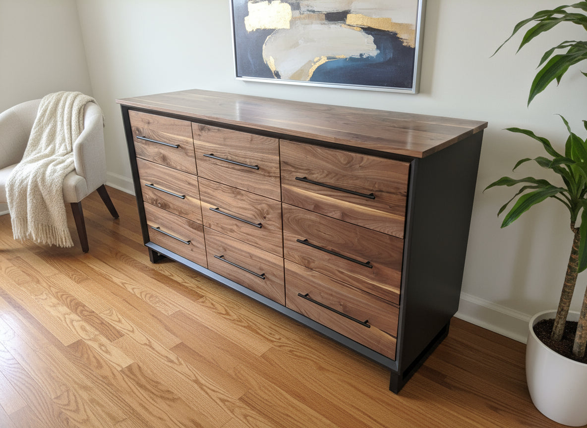 6foot 9 drawer walnut faced modern dresser in black with solid walnut top on steel legs.