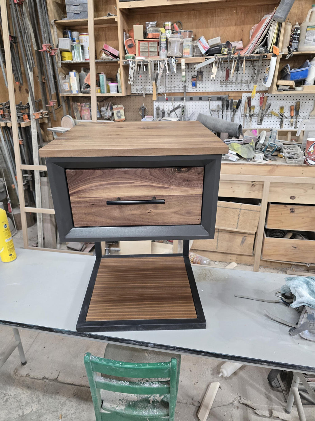 Handcrafted single drawer modern nightstands in black with real walnut and bottom shelf on steel legs