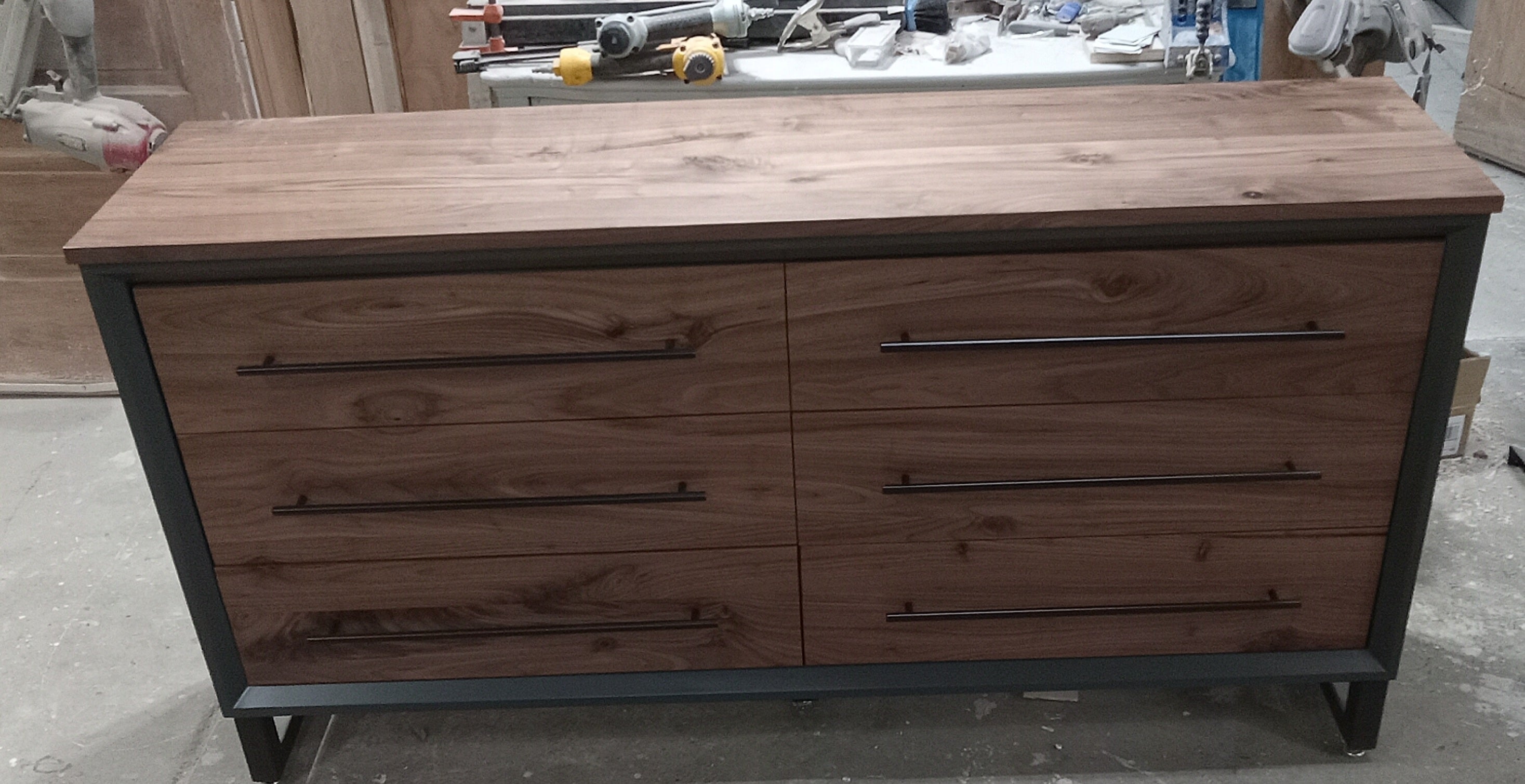 60" Modern 6 drawer dresser in iron finish with walnut fronts and top.